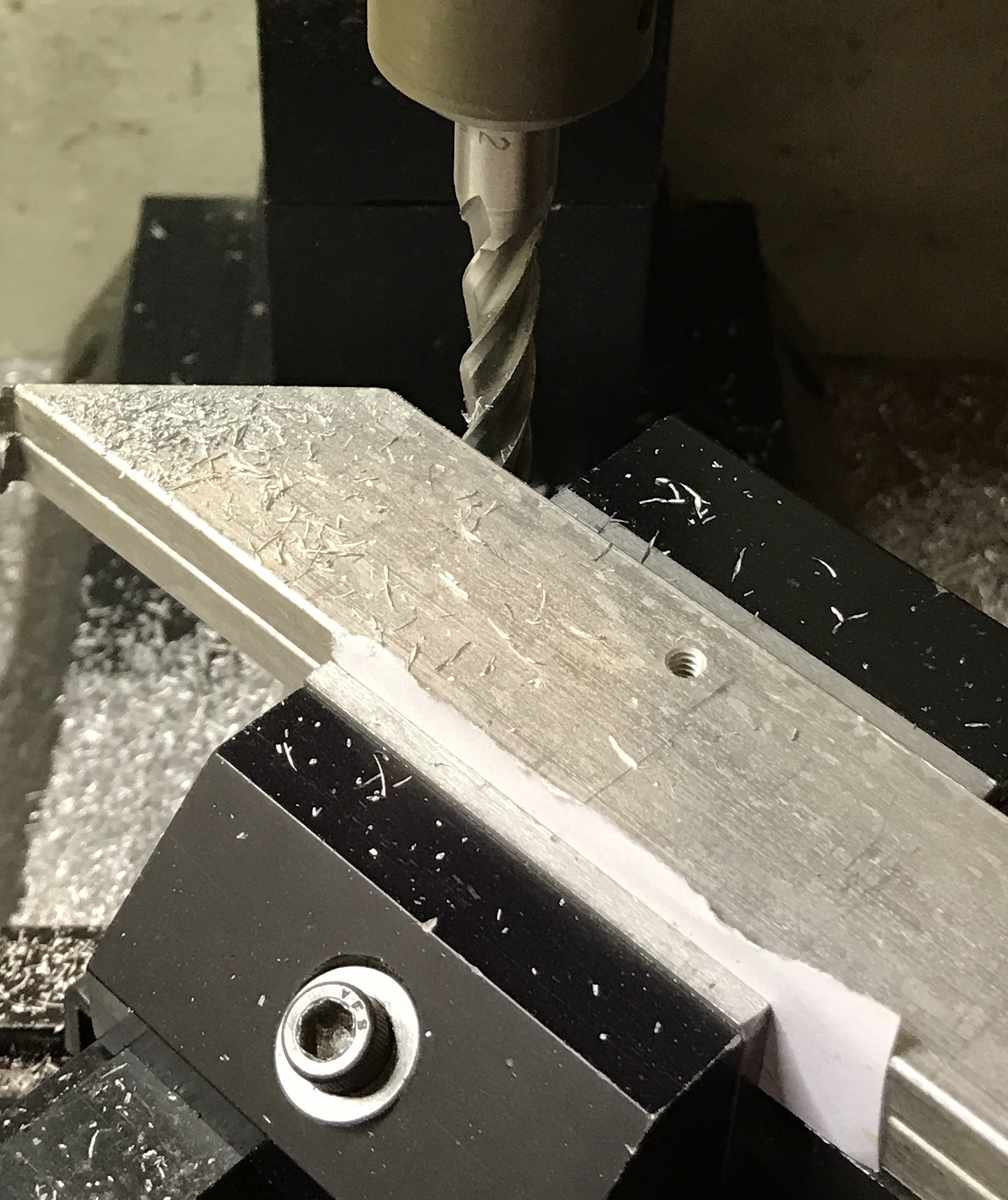 Two sliding clamp bottoms being cut